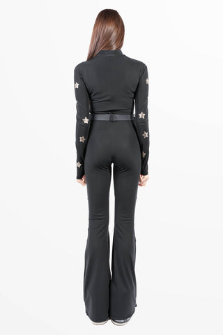 Crans-Montana black skisuit with stars